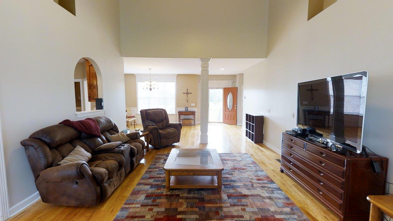 919 Sam Johnson Road Columbia, TN 38401 - Photo 5 of 29 a living room with furniture and a flat screen tv