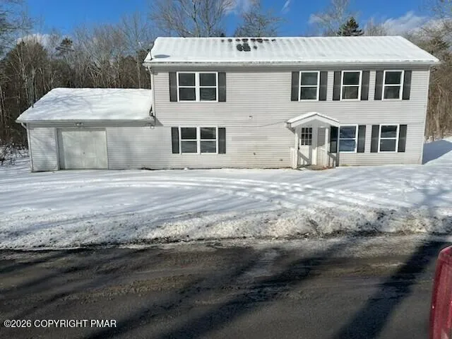 a kitchen with granite countertop a stove and a sink