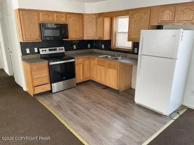 a view of a livingroom and window