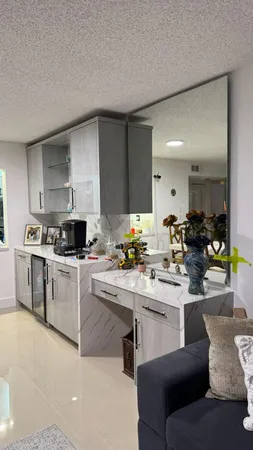 a kitchen with a sink cabinets and counter space