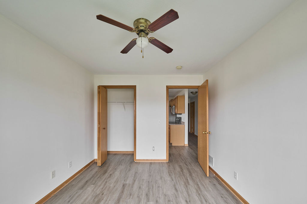 962 Arvle Circle, Unit 962 Sycamore, IL 60178 - Photo 17 of 18 wooden floor in an empty room