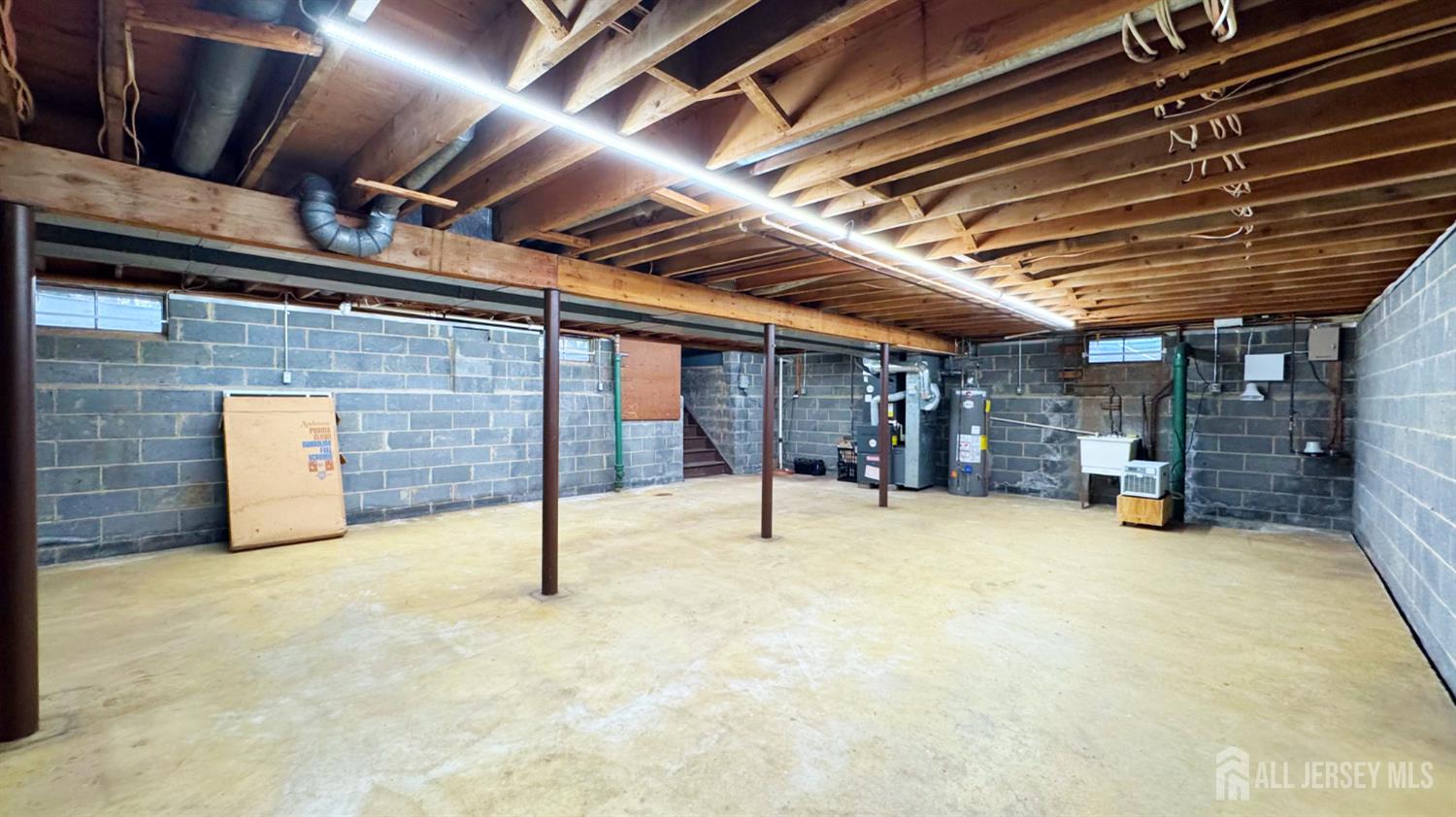 26 Lucille Court Edison, NJ 08820 - Photo 16 of 22 a view of an empty room with a garage