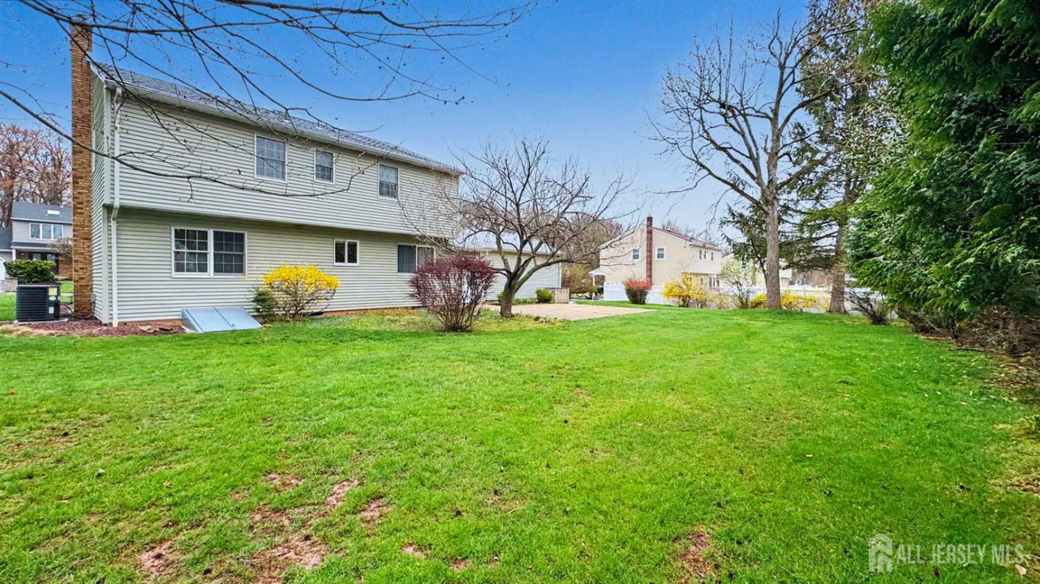 26 Lucille Court Edison, NJ 08820 - Photo 20 of 22 a front view of a house with garden