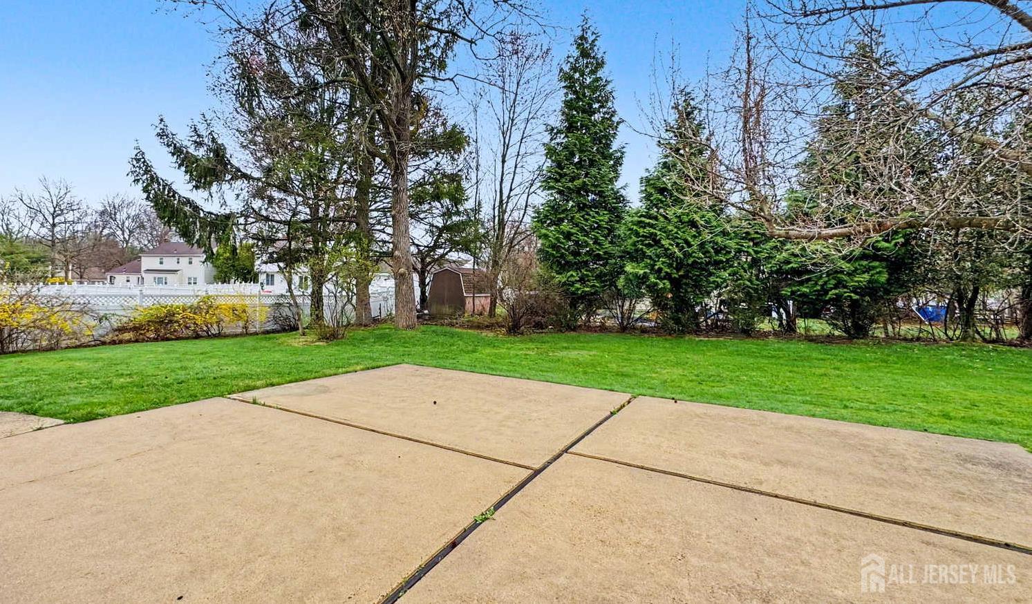 26 Lucille Court Edison, NJ 08820 - Photo 21 of 22 front view of a house with a yard