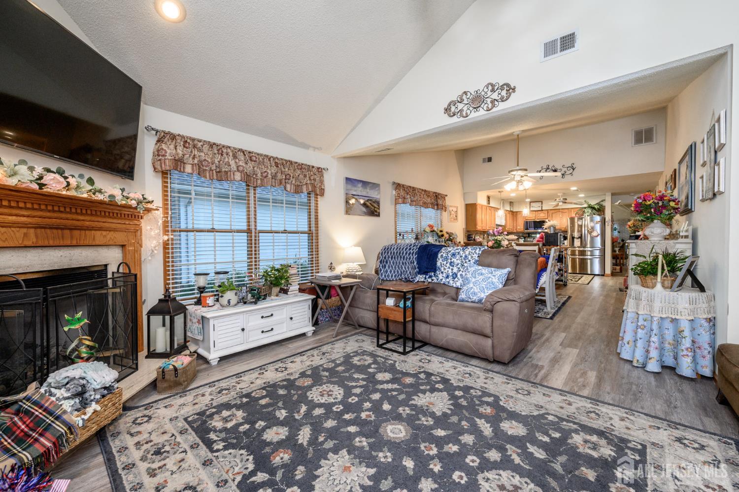 1617 Sweetbay Drive Toms River, NJ 08755 - Photo 19 of 32 a living room with furniture and a flat screen tv