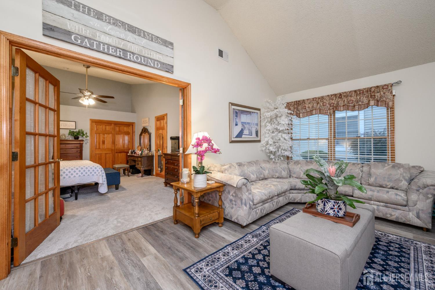 1617 Sweetbay Drive Toms River, NJ 08755 - Photo 21 of 32 a living room with furniture and a potted plant