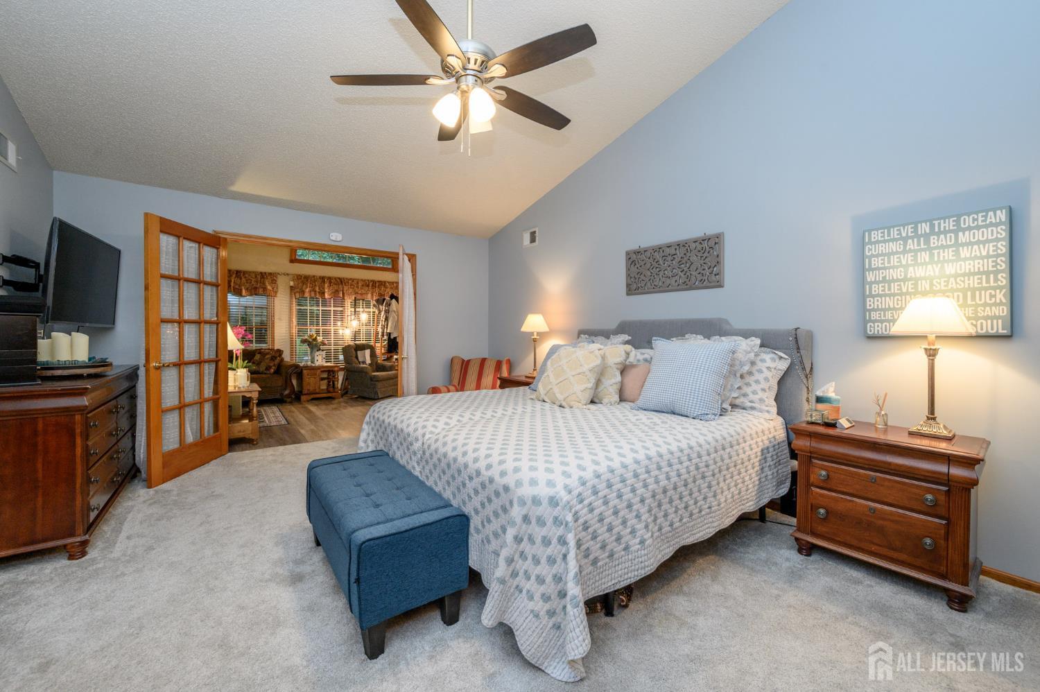 1617 Sweetbay Drive Toms River, NJ 08755 - Photo 23 of 32 a spacious bedroom with a bed and a couch