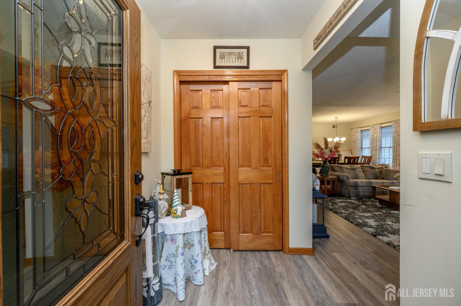 1617 Sweetbay Drive Toms River, NJ 08755 - Photo 3 of 32 a view of a kitchen with furniture and wooden floor