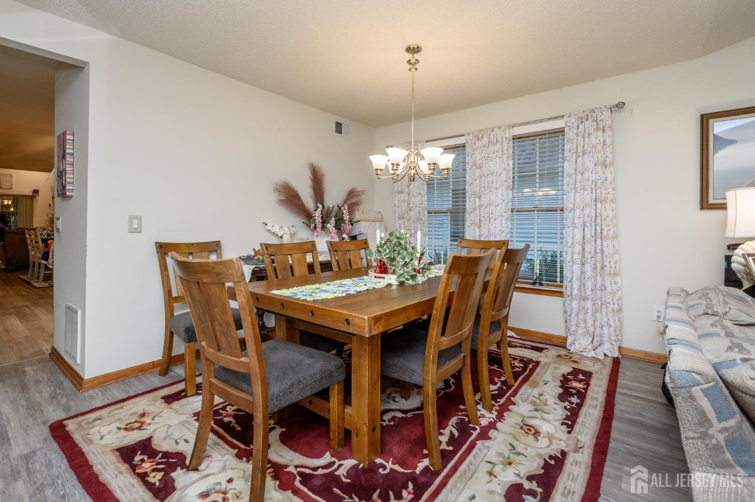 1617 Sweetbay Drive Toms River, NJ 08755 - Photo 7 of 32 a dining room with furniture and window