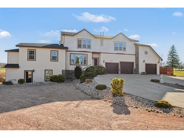 a swimming pool with outdoor seating