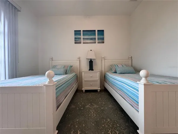 a bathroom with a tub and window