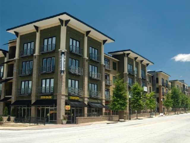 a front view of a building with a street