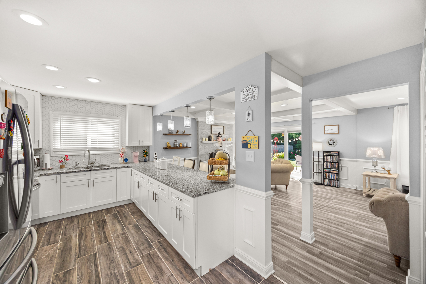 520 Chestnut Lane Beecher, IL 60401 - Photo 15 of 27 a kitchen with sink cabinets and wooden floor