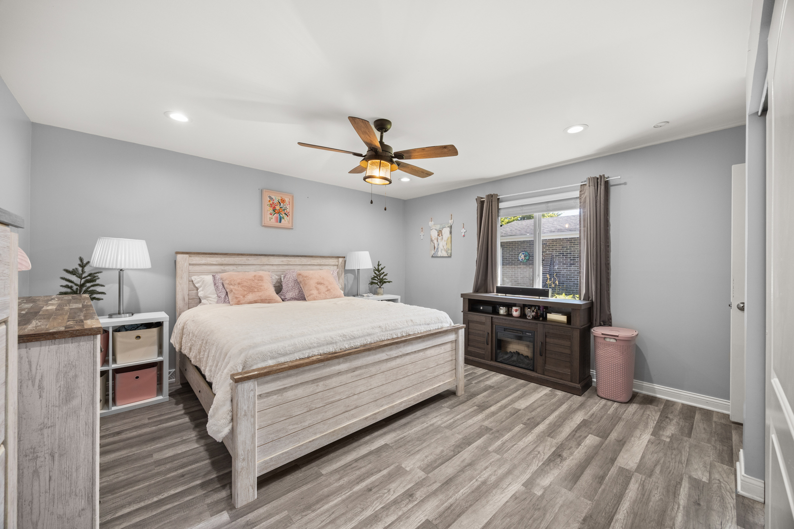 520 Chestnut Lane Beecher, IL 60401 - Photo 21 of 27 a bedroom with a bed and wooden floor