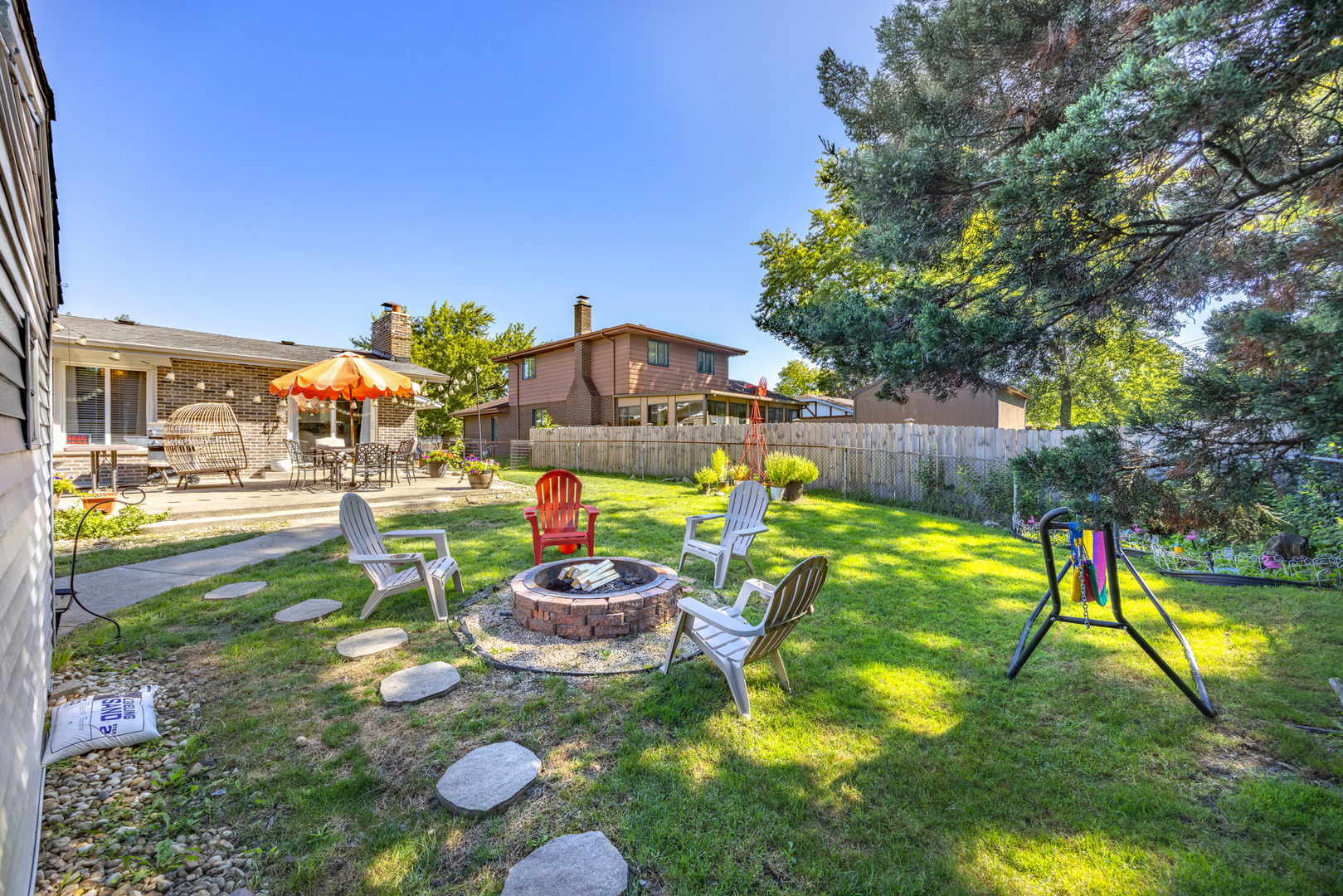 520 Chestnut Lane Beecher, IL 60401 - Photo 25 of 27 a view of a swimming pool with a patio
