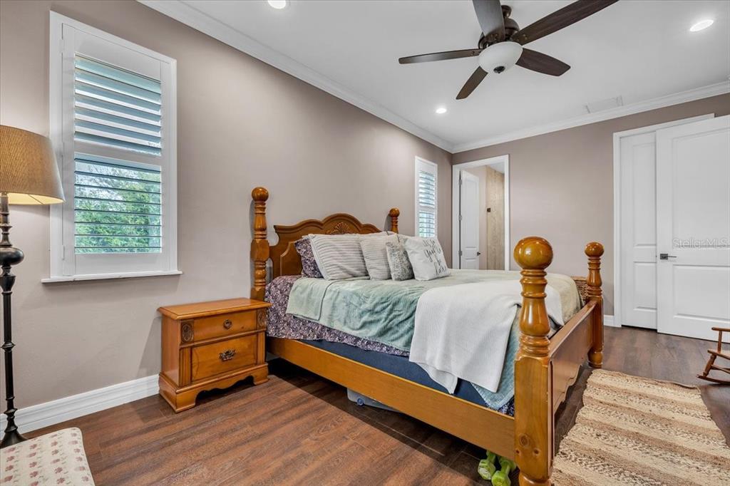 8429 Southwest Riverview Circle Arcadia, FL 34269 - Photo 18 of 45 a living room with a bed furniture and a window