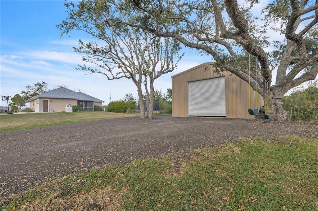 8429 Southwest Riverview Circle Arcadia, FL 34269 - Photo 2 of 45 a view of house with outdoor space
