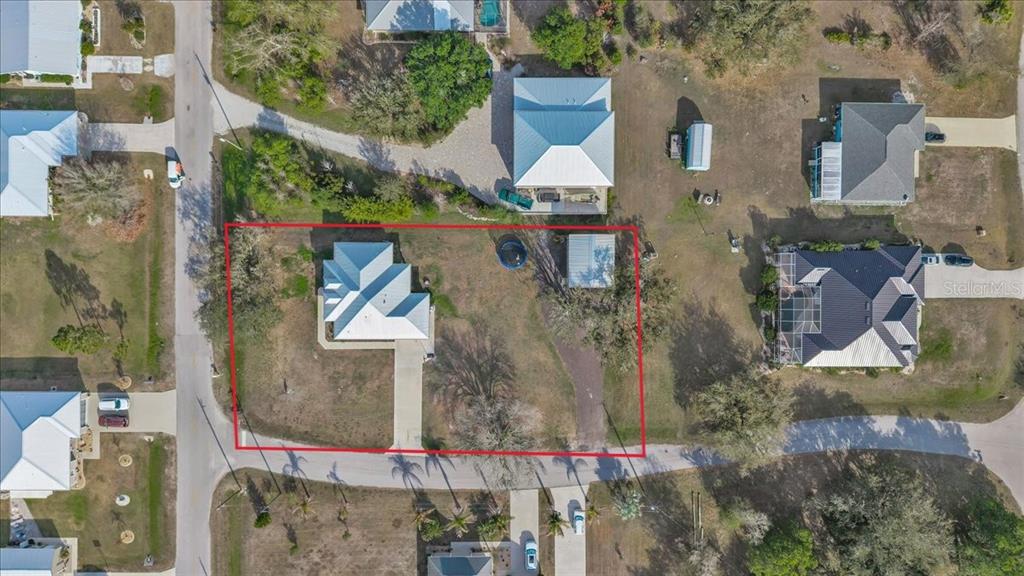 8429 Southwest Riverview Circle Arcadia, FL 34269 - Photo 32 of 45 an aerial view of residential houses with outdoor space