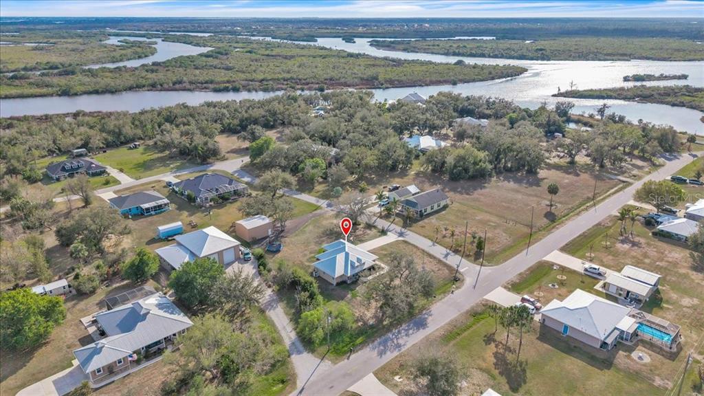 8429 Southwest Riverview Circle Arcadia, FL 34269 - Photo 35 of 45 an aerial view of residential houses with outdoor space