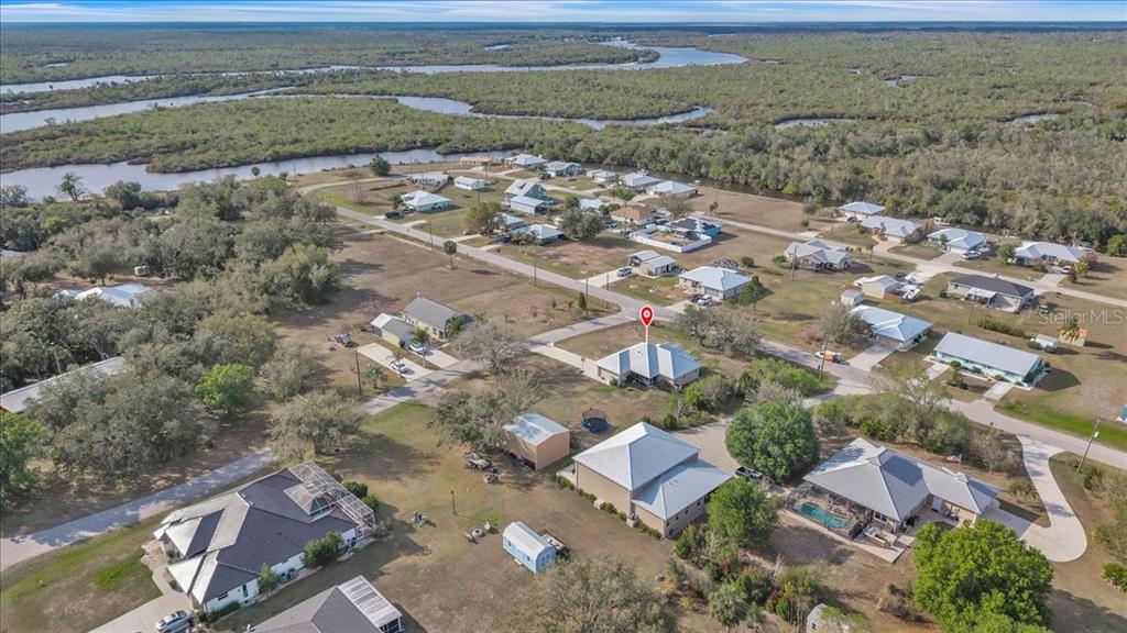 8429 Southwest Riverview Circle Arcadia, FL 34269 - Photo 37 of 45 an aerial view of residential houses with outdoor space