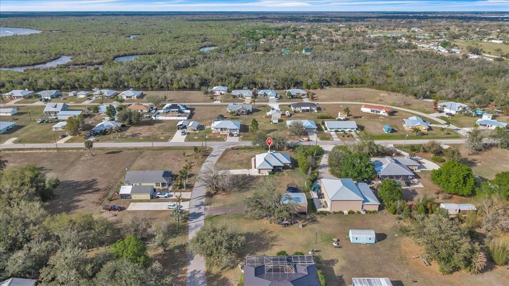 8429 Southwest Riverview Circle Arcadia, FL 34269 - Photo 38 of 45 an aerial view of residential house with outdoor space