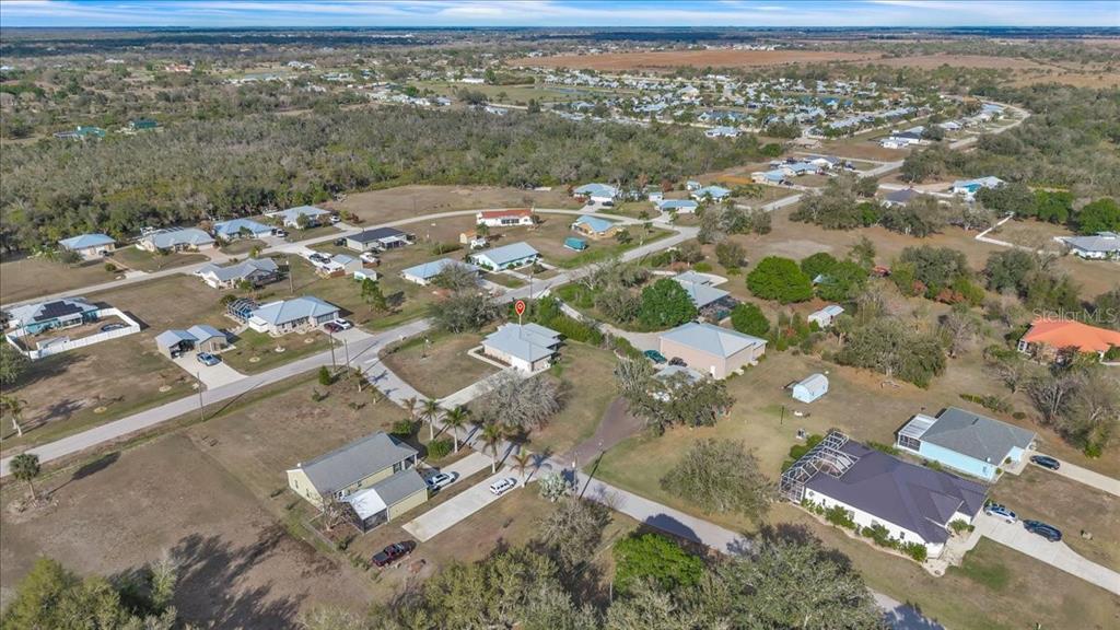 8429 Southwest Riverview Circle Arcadia, FL 34269 - Photo 39 of 45 an aerial view of residential building with parking space