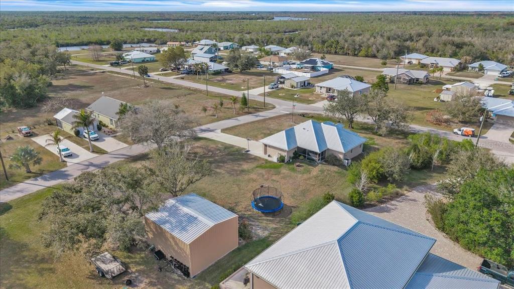 8429 Southwest Riverview Circle Arcadia, FL 34269 - Photo 41 of 45 an aerial view of a house with a yard