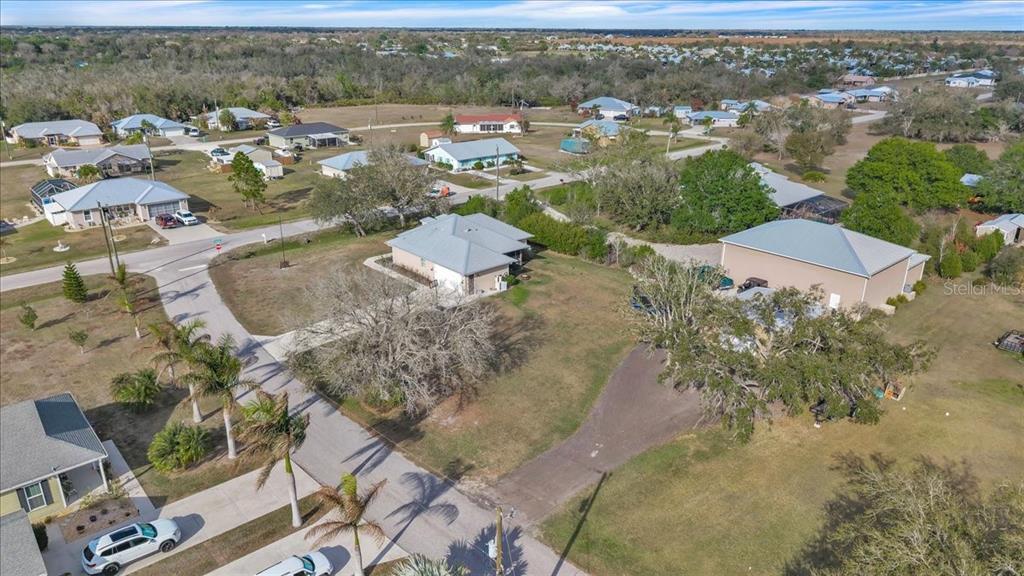 8429 Southwest Riverview Circle Arcadia, FL 34269 - Photo 42 of 45 an aerial view of residential houses with outdoor space