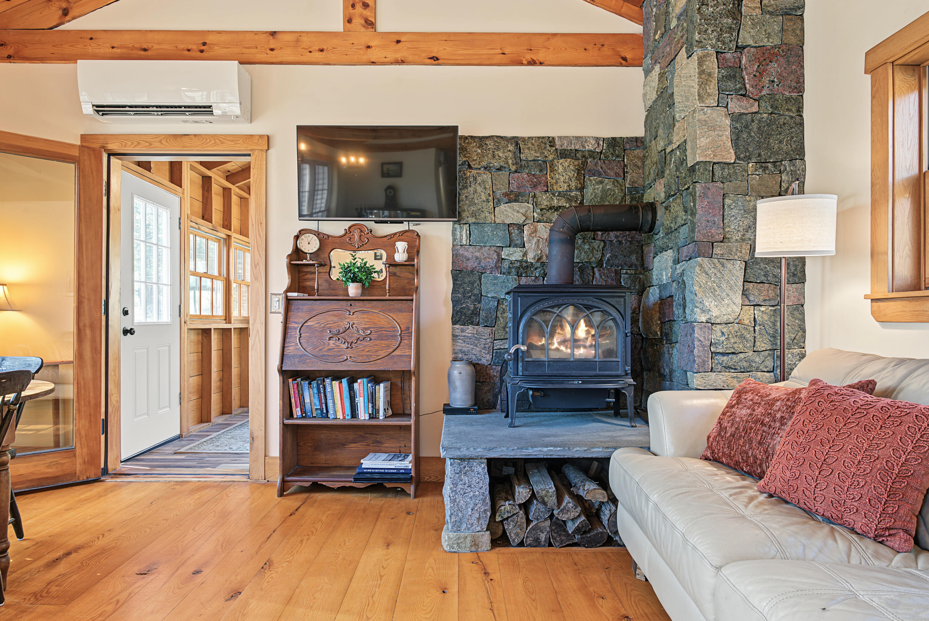 1581 Main Road Westport Island, ME 04578 - Photo 12 of 86 Living room with cozy wood stove