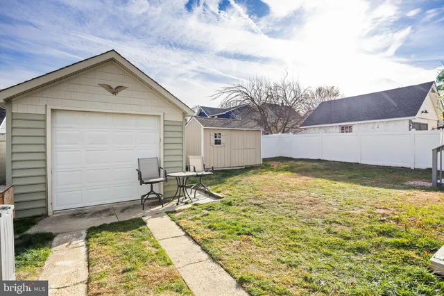 a house view with a backyard space