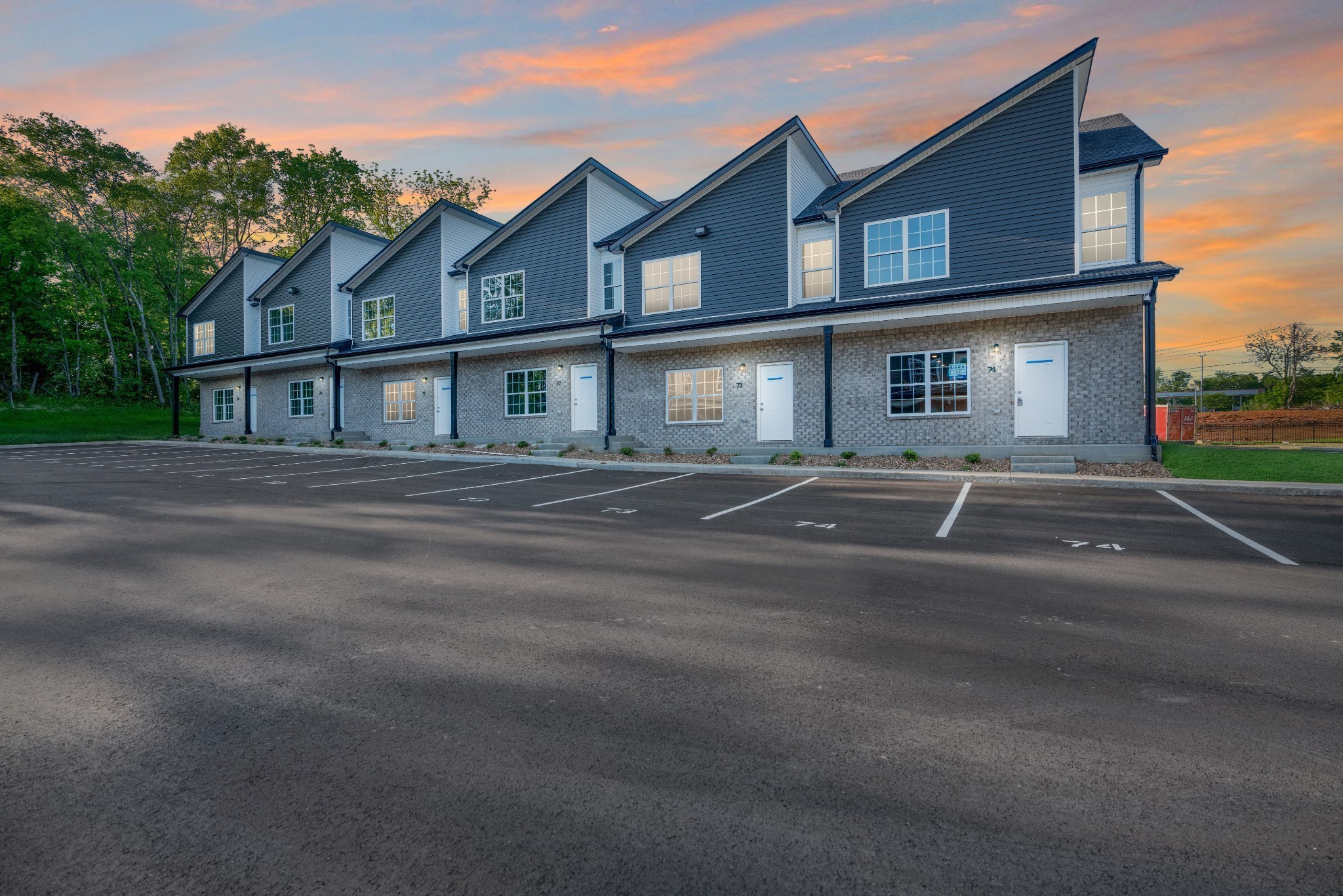 a front view of a house with yard