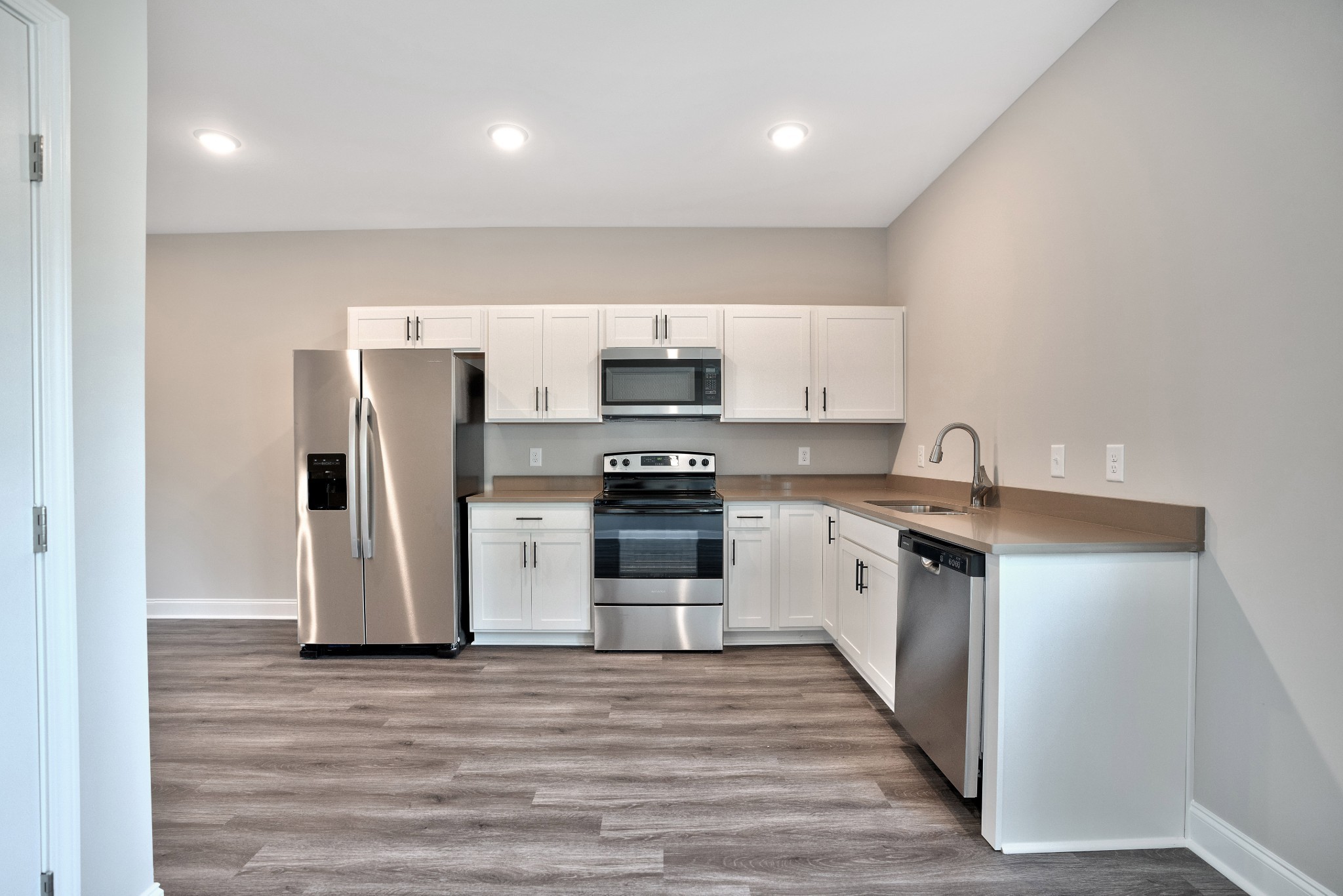 2500 Tiny Town Road, Unit 70 Clarksville, TN 37042 - Photo 11 of 27 a kitchen with a refrigerator and a stove top oven