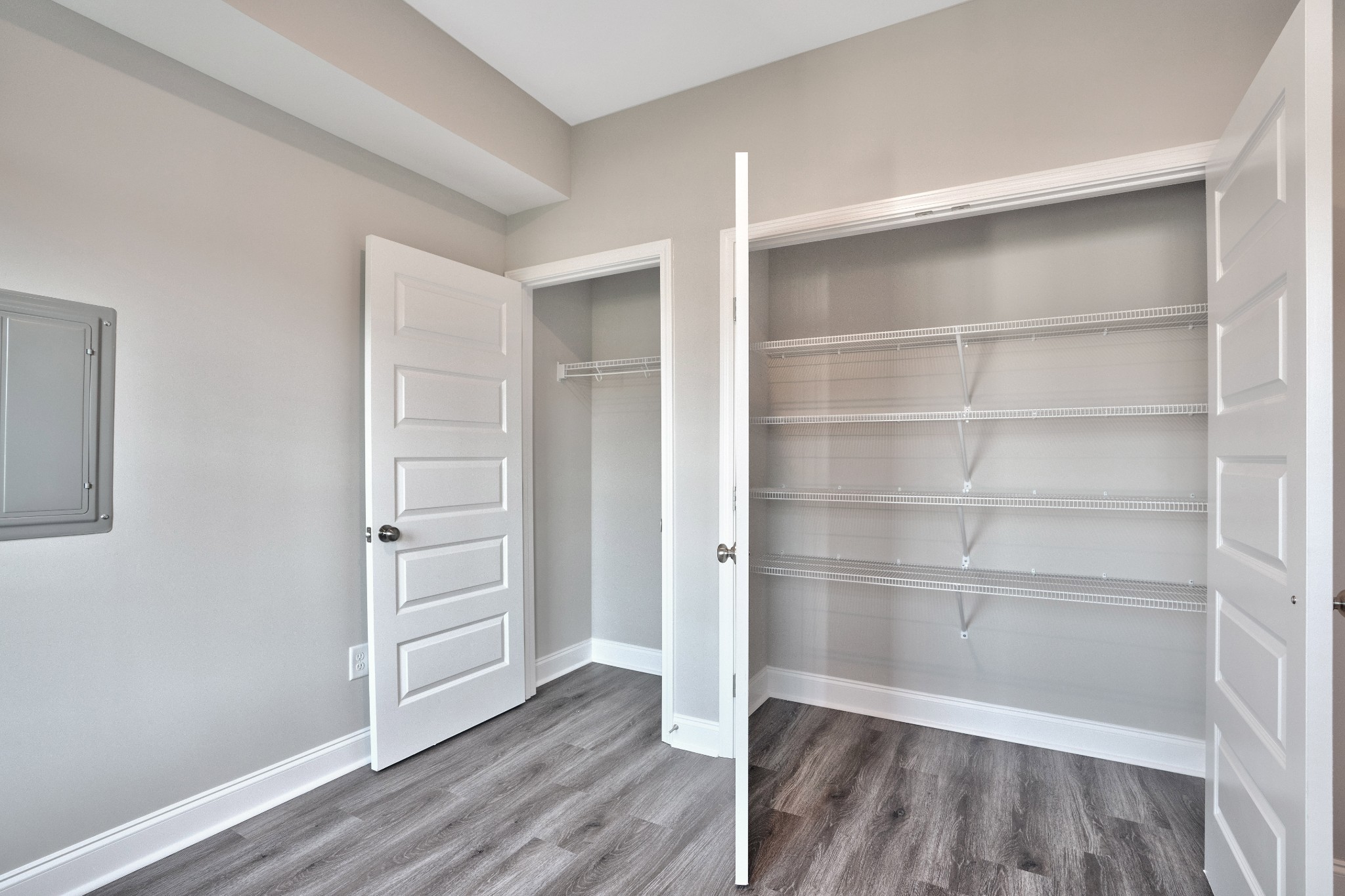 2500 Tiny Town Road, Unit 70 Clarksville, TN 37042 - Photo 12 of 27 a room with walk in closet and wooden floor