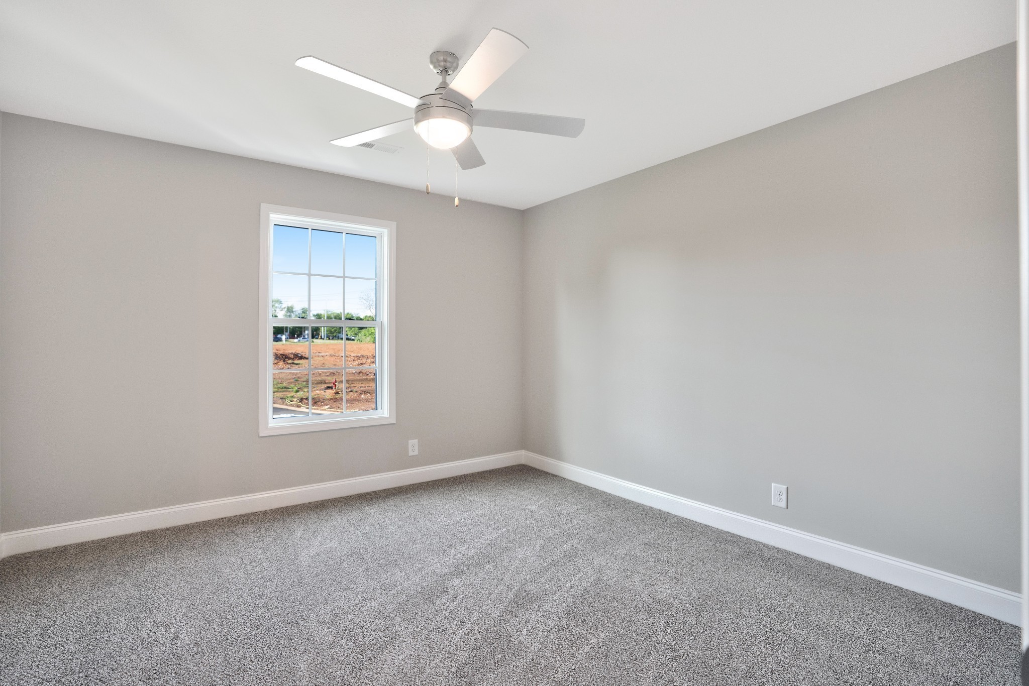 2500 Tiny Town Road, Unit 70 Clarksville, TN 37042 - Photo 16 of 27 an empty room with windows and fan