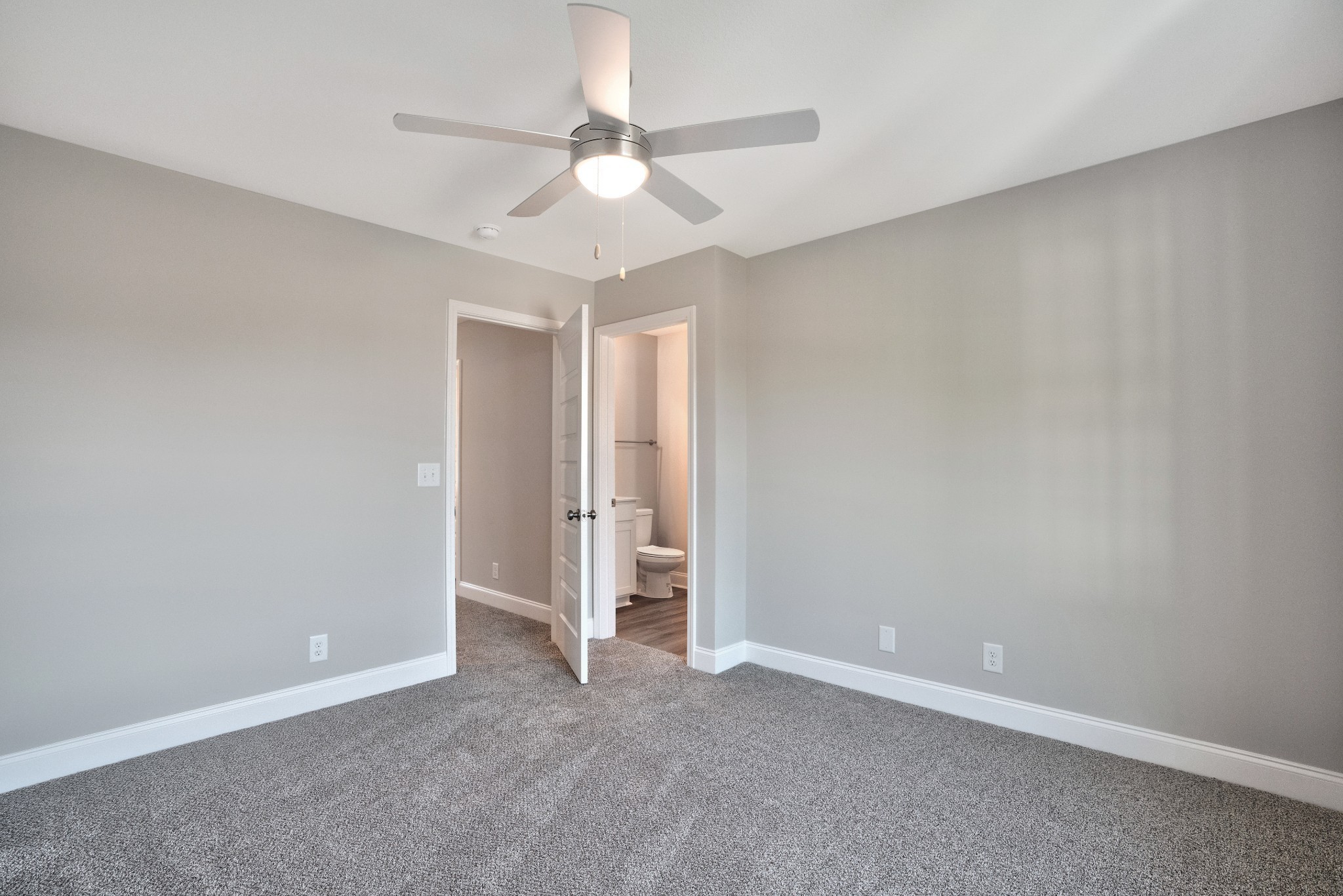 2500 Tiny Town Road, Unit 70 Clarksville, TN 37042 - Photo 17 of 27 an empty room with a ceiling fan and a window