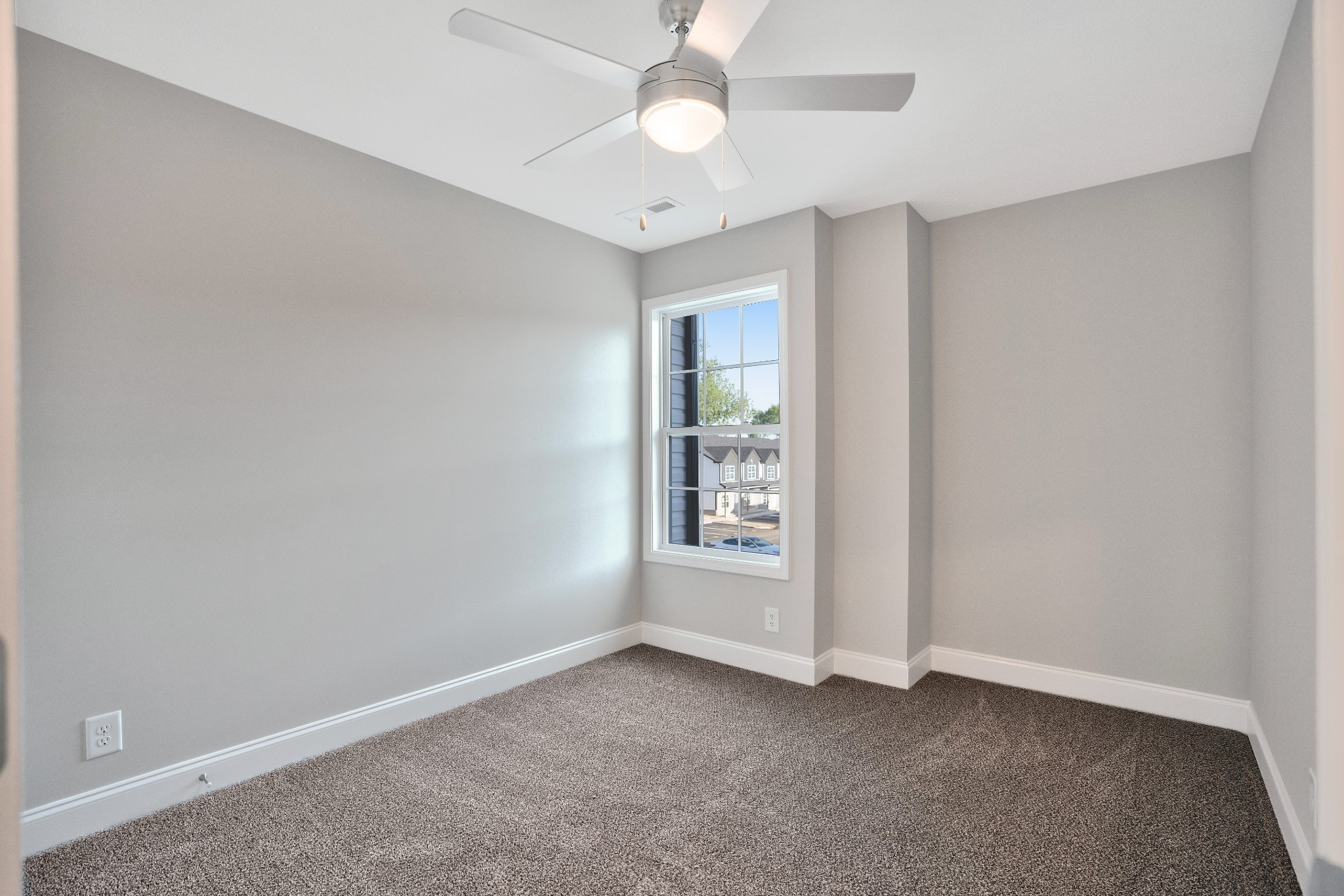 2500 Tiny Town Road, Unit 70 Clarksville, TN 37042 - Photo 20 of 27 an empty room with chandelier fan and windows