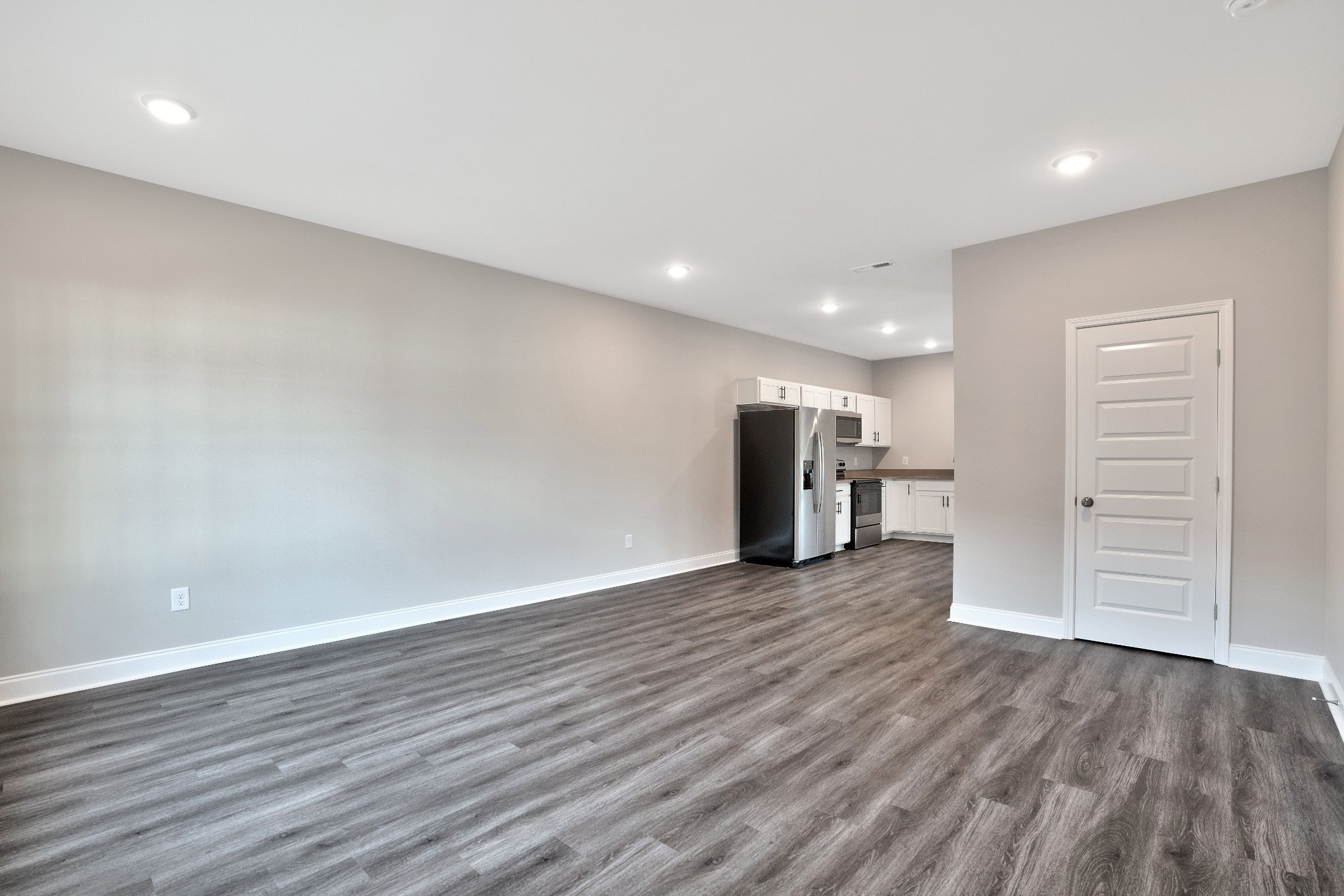 2500 Tiny Town Road, Unit 70 Clarksville, TN 37042 - Photo 3 of 27 a view of an empty room with wooden floor