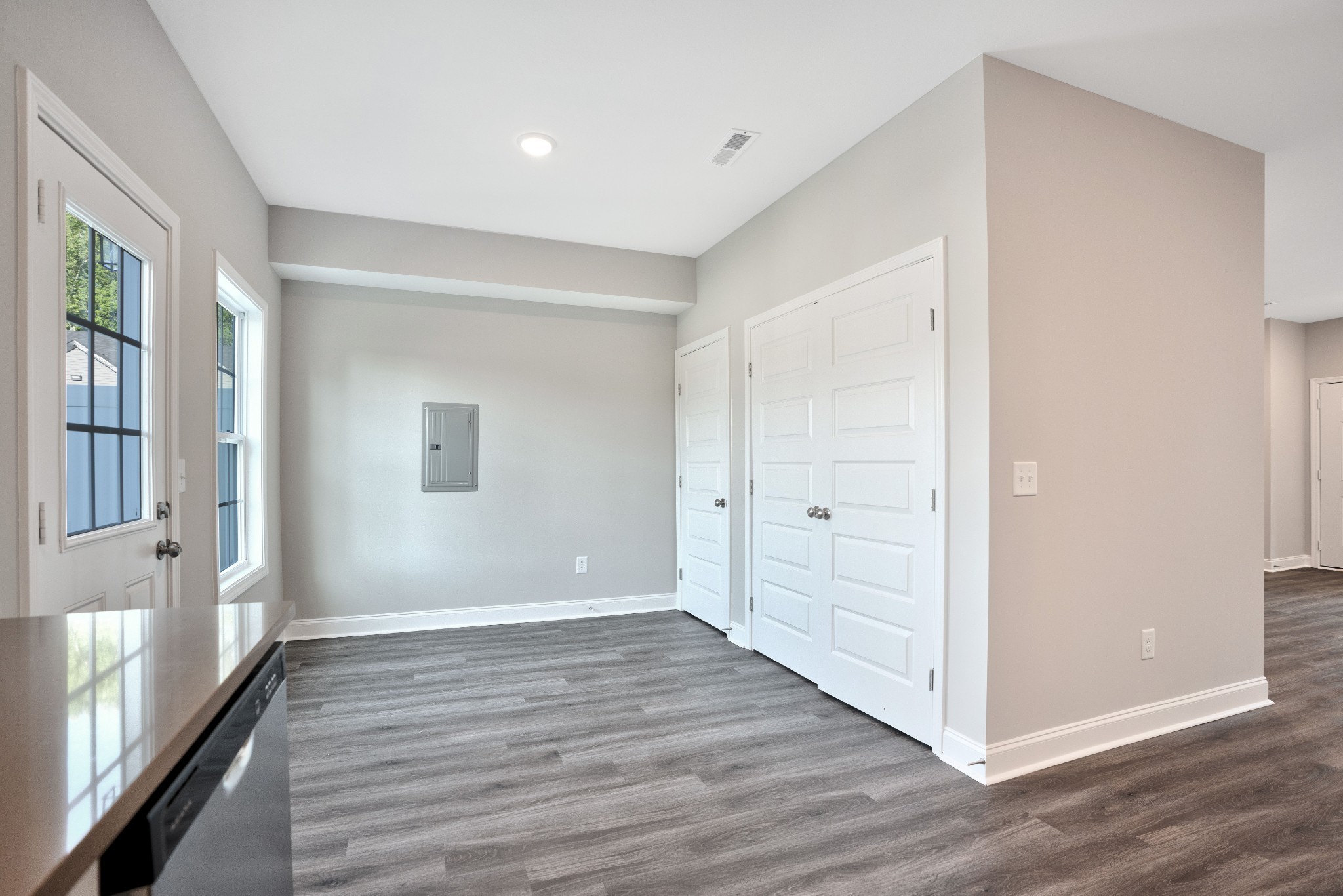 2500 Tiny Town Road, Unit 70 Clarksville, TN 37042 - Photo 10 of 27 a view of an empty room with wooden floor and a window