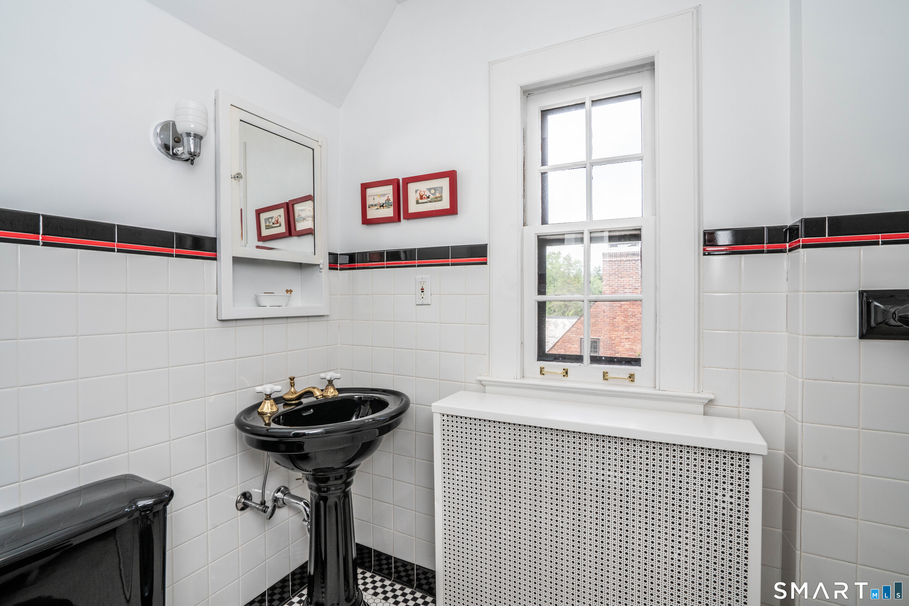 7 Fernwood Road West Hartford, CT 06119 - Photo 30 of 40 a bathroom with a sink and a window