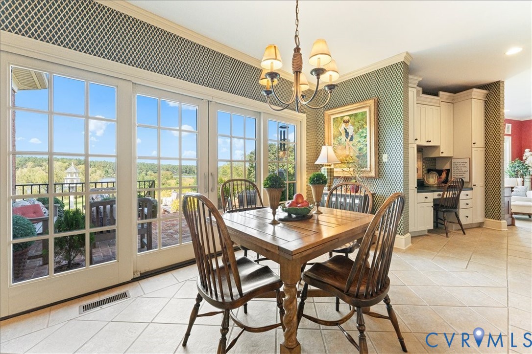 3581 Richards Run Powhatan, VA 23139 - Photo 21 of 50 a view of a dining room with furniture window and outside view
