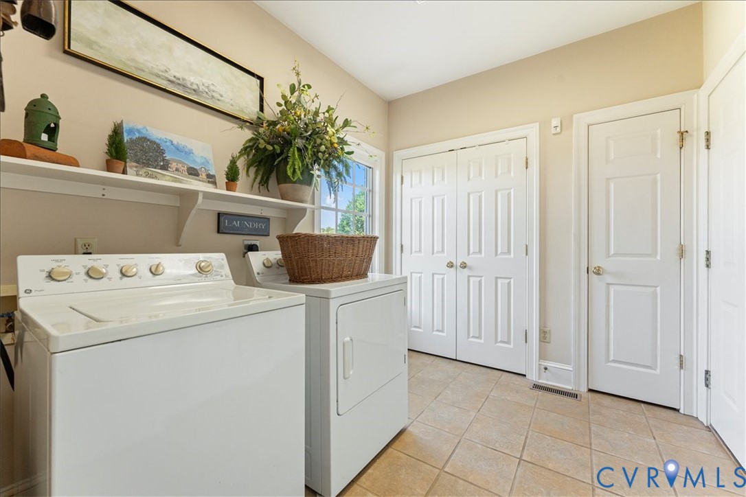 3581 Richards Run Powhatan, VA 23139 - Photo 28 of 50 a utility room with dryer and washer