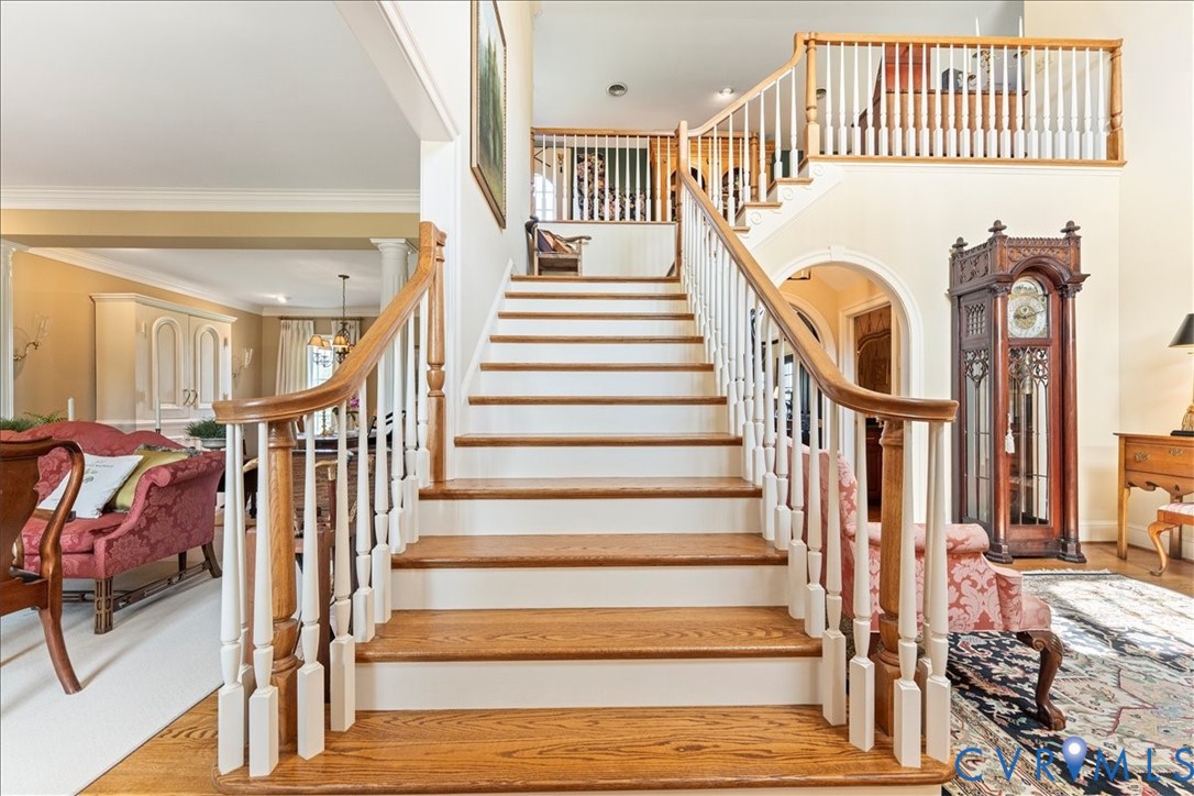 3581 Richards Run Powhatan, VA 23139 - Photo 29 of 50 a view of staircase with lots of frames on wall and a window