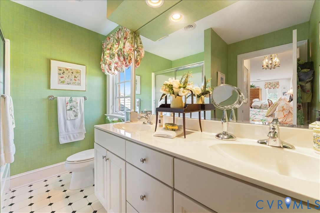 3581 Richards Run Powhatan, VA 23139 - Photo 34 of 50 a bathroom with a sink a toilet and a mirror