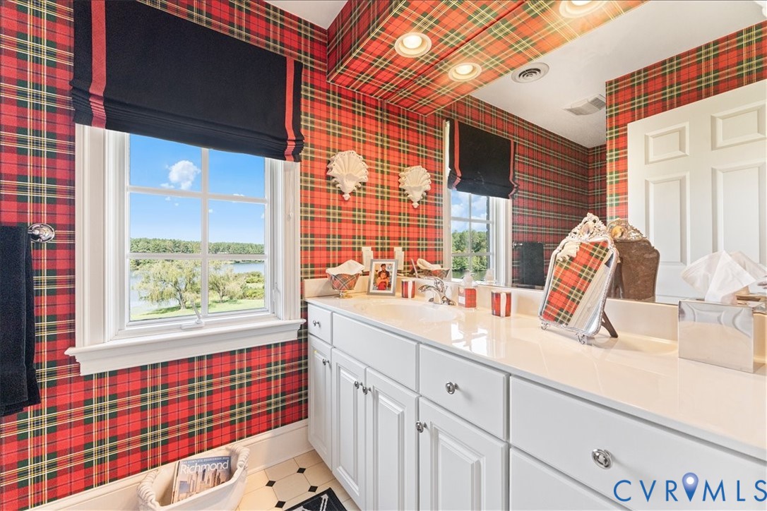 3581 Richards Run Powhatan, VA 23139 - Photo 36 of 50 a kitchen with stainless steel appliances sink window and cabinets