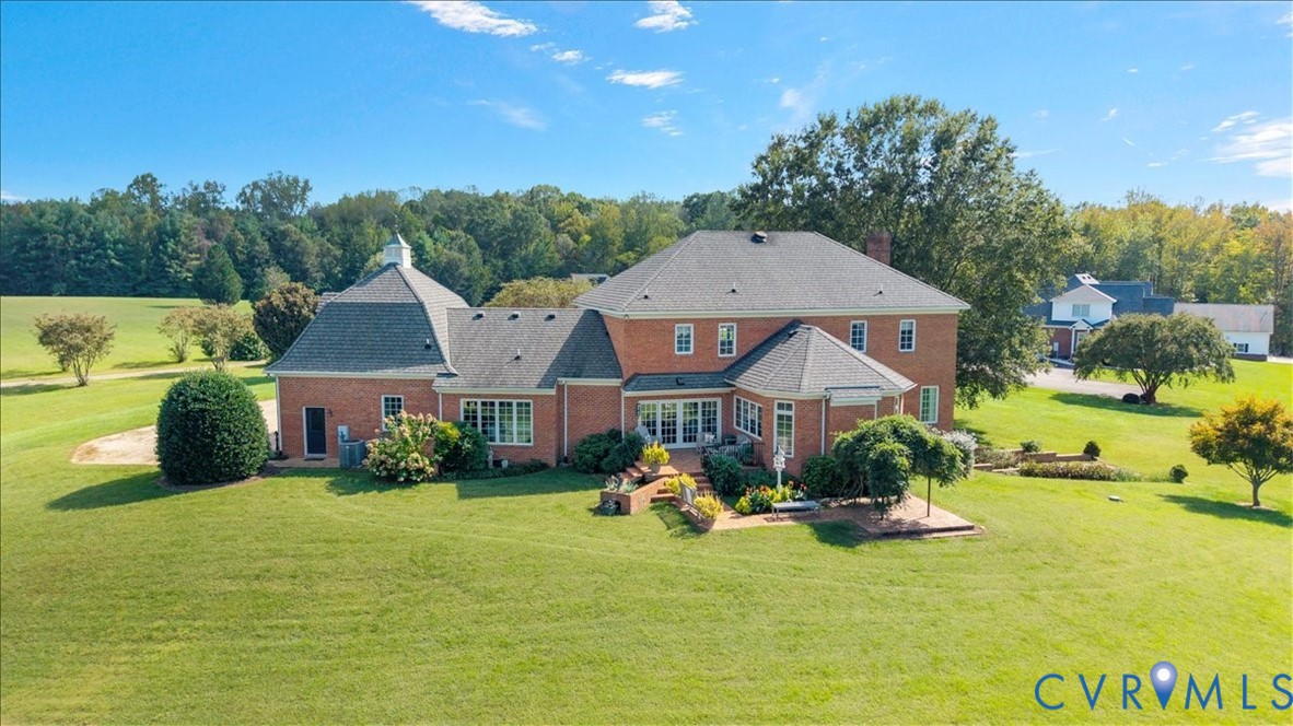 3581 Richards Run Powhatan, VA 23139 - Photo 48 of 50 a front view of a house with garden