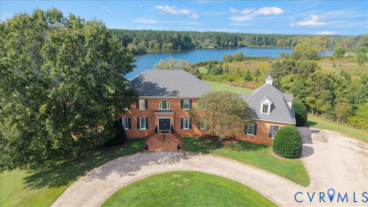 3581 Richards Run Powhatan, VA 23139 - Photo 50 of 50 an aerial view of a house with outdoor space and lake view