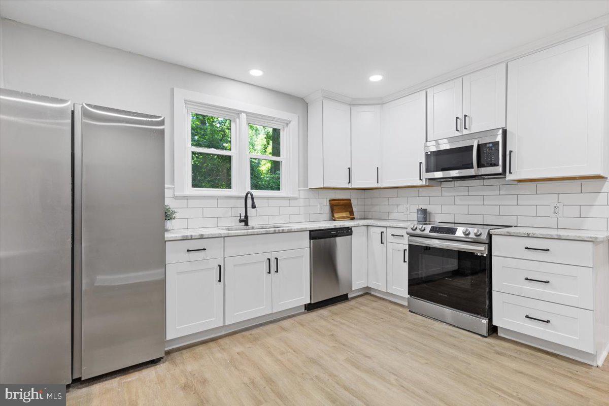 Gorgeous white & stainless kitchen