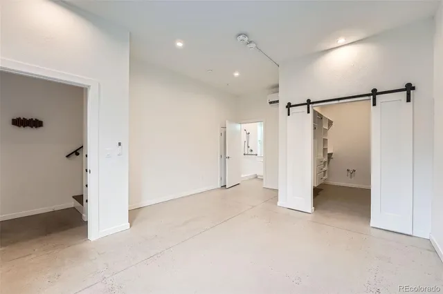 a view of an empty walk in closet