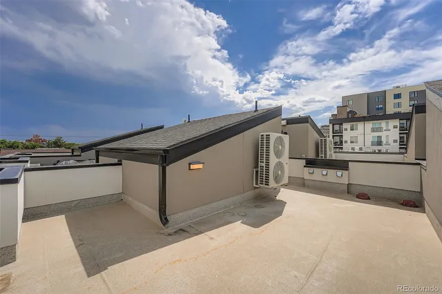 a front view of building with street