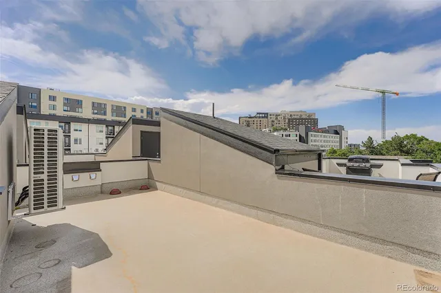 a view of street with parked cars